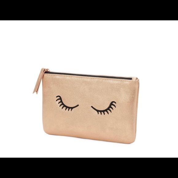 Stella & Dot Handbags - Mini pouch embroidered lashes rose gold